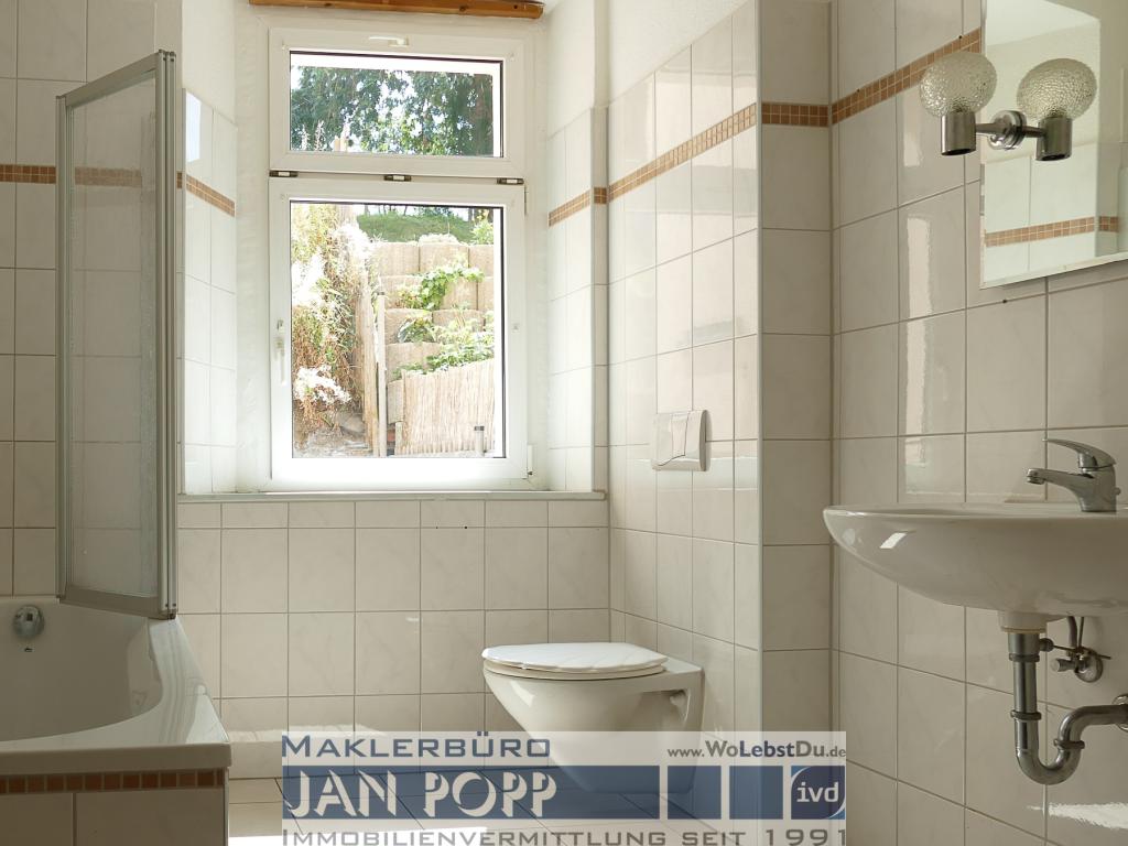 Zwei Etagen, Einbauküche und Gartenterrasse - Foto 4