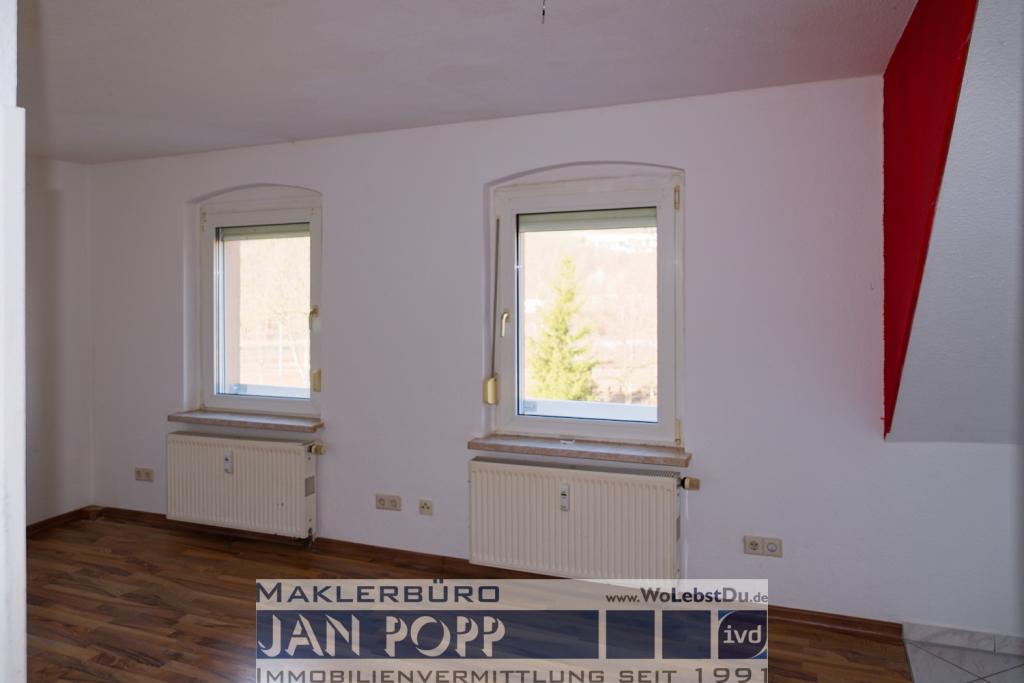 Preiswerte Maisonettewohnung mit Dachschrägen - Photo 1