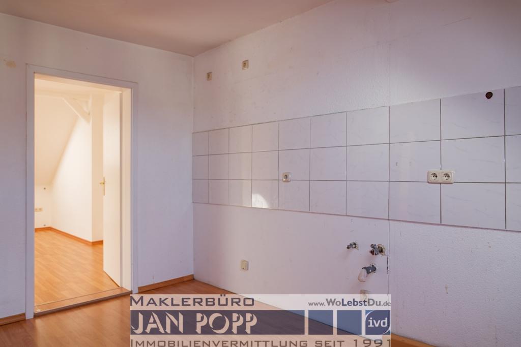 Gemütliche Etagenwohnung mit Dachschrägen, Sichtbalken und offener Küche - EBK möglich - Foto 2