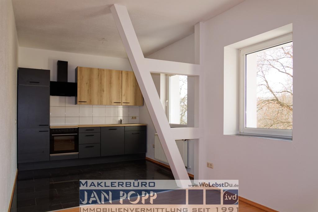 Wohnen mit Einbauküche und Parkblick - Foto 1