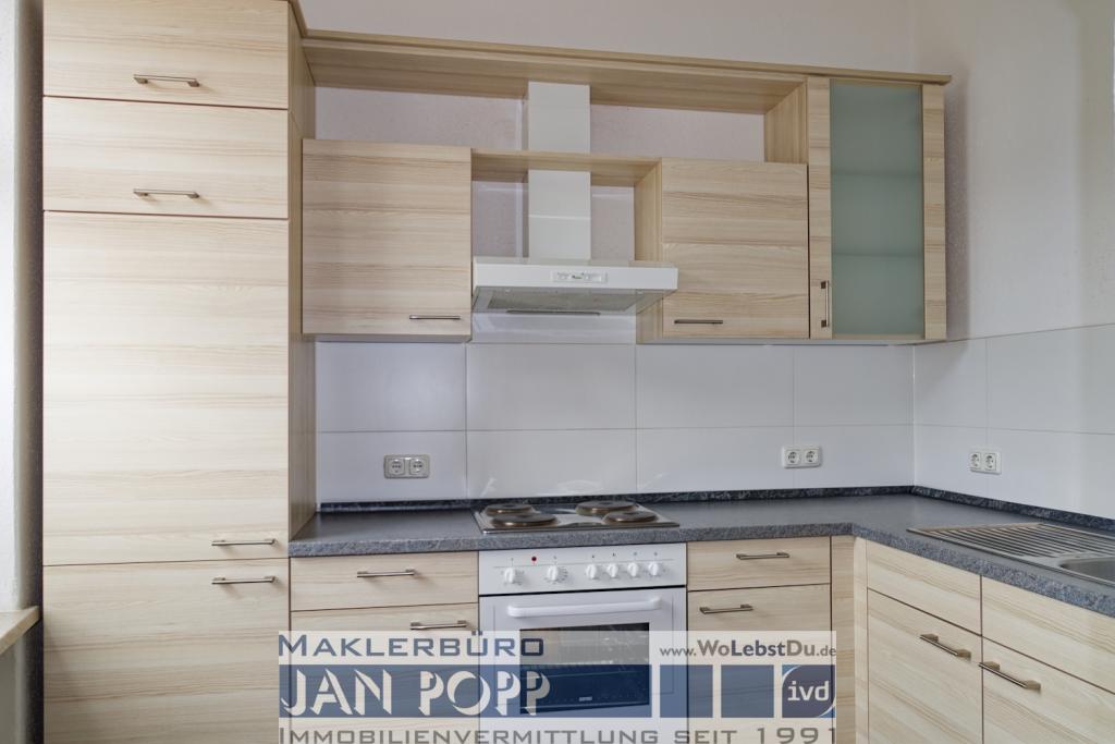 Etagenwohnung mit Balkon und Einbauküche - Foto 1