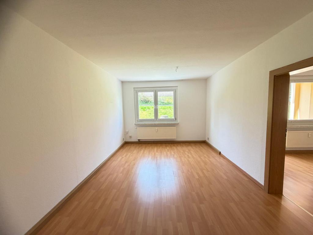 Im Erdgeschoss mit Balkon! - Photo 1