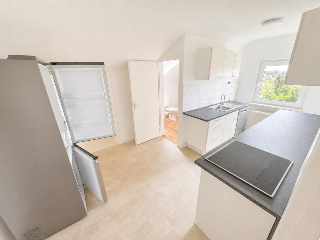 Großzügige Dachgeschosswohnung in Altbauvilla - Photo 1