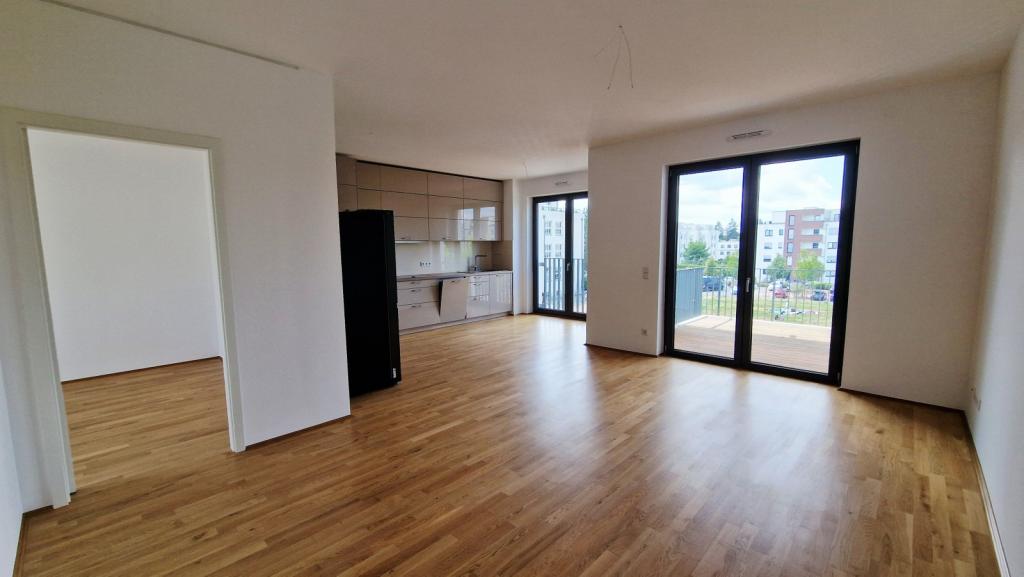 ERSTBEZUG - Attraktive Neubauwohnung mit EBK und TG-Stellplatz! - Photo 2