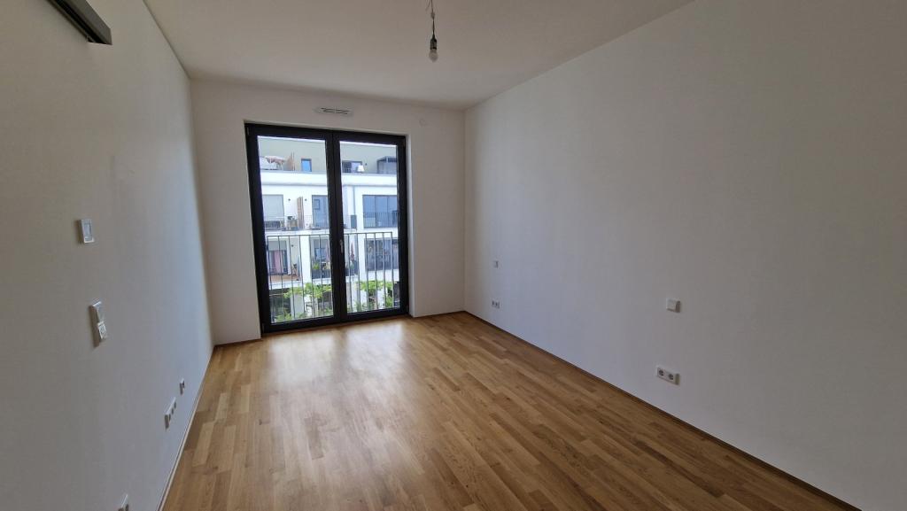 ERSTBEZUG - Attraktive Neubauwohnung mit EBK und TG-Stellplatz! - Photo 1