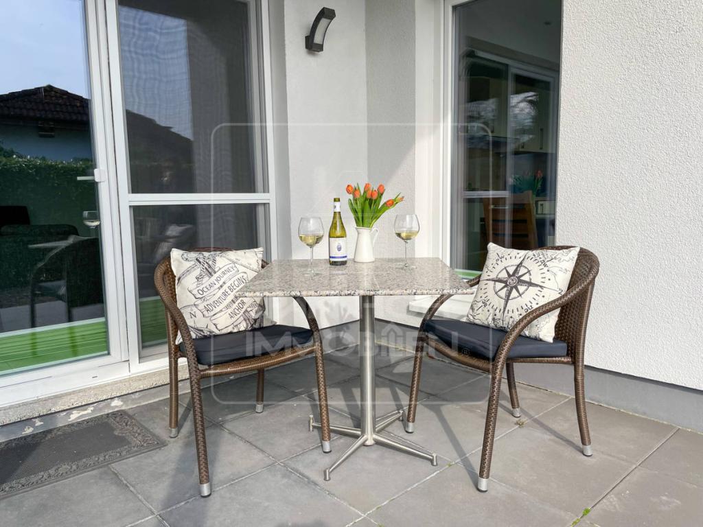 Terrasse in Süd-West-Lage mit Zugang zum Garten