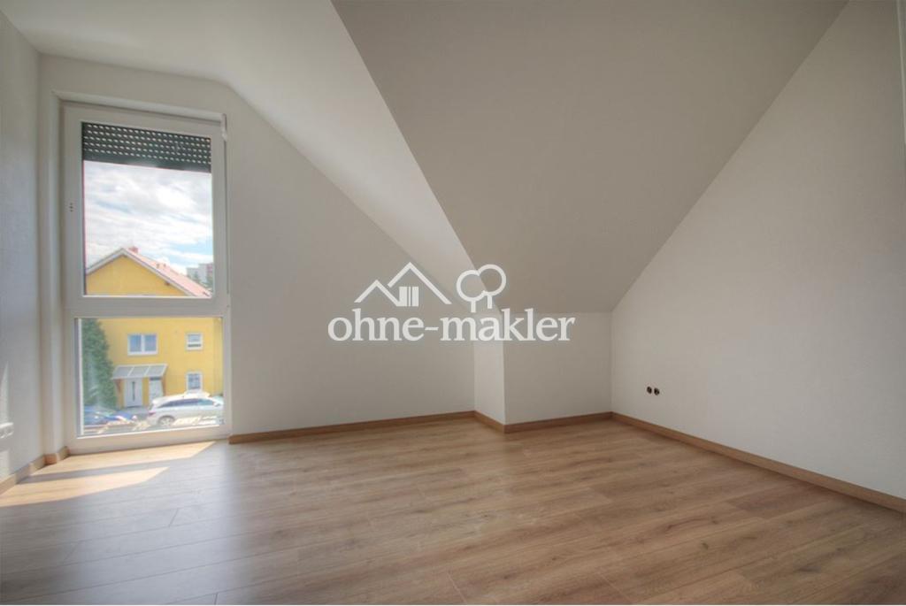 Großzügige Maisonette-Wohnung im Niedrigenergiehaus mit Blick ins Grüne - Foto 1