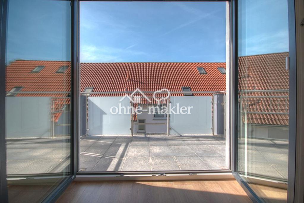 Großzügige Maisonette-Wohnung im Niedrigenergiehaus mit Blick ins Grüne - Foto 4