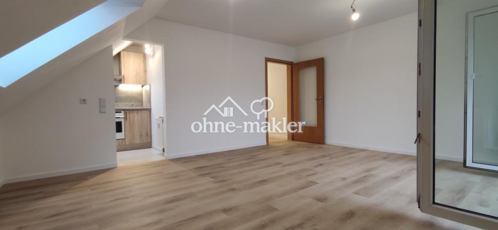 Modernisierte 2-Zimmer Wohnung im 2. OG mit EBK, Balkon, KFZ-Stellplatz und Kellerabteil - Photo 2