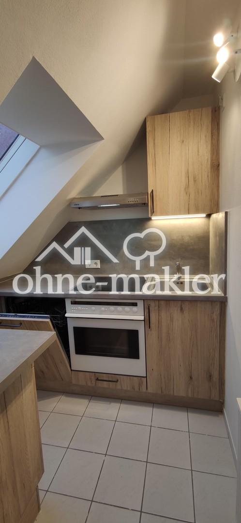 Modernisierte 2-Zimmer Wohnung im 2. OG mit EBK, Balkon, KFZ-Stellplatz und Kellerabteil - Photo 4