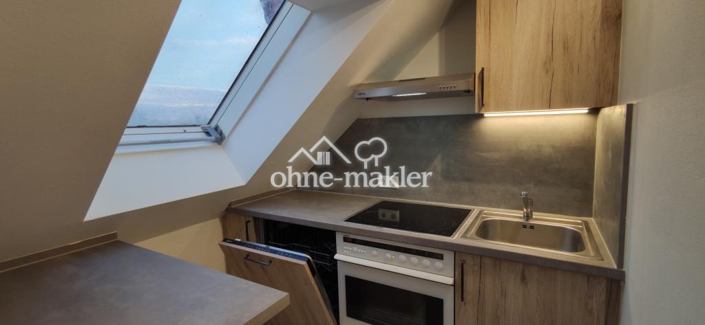 Modernisierte 2-Zimmer Wohnung im 2. OG mit EBK, Balkon, KFZ-Stellplatz und Kellerabteil - Photo 5