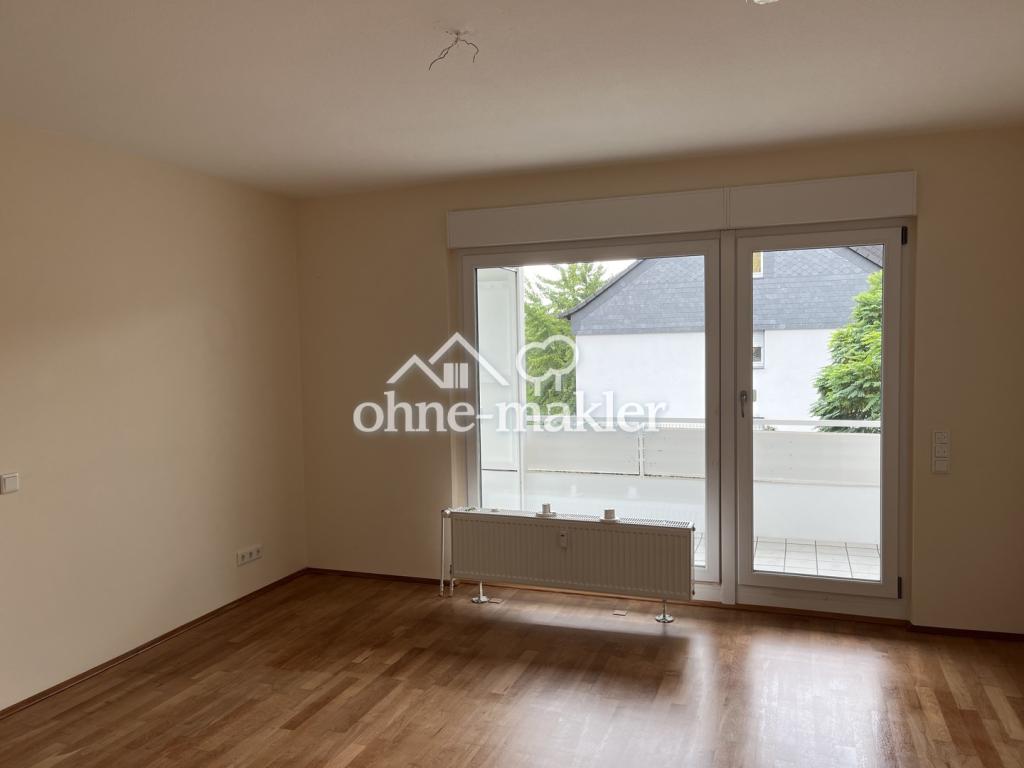Wohnung mit überdachtem Südbalkon, kernsaniertem Bad und Einbauküche. - Foto 2