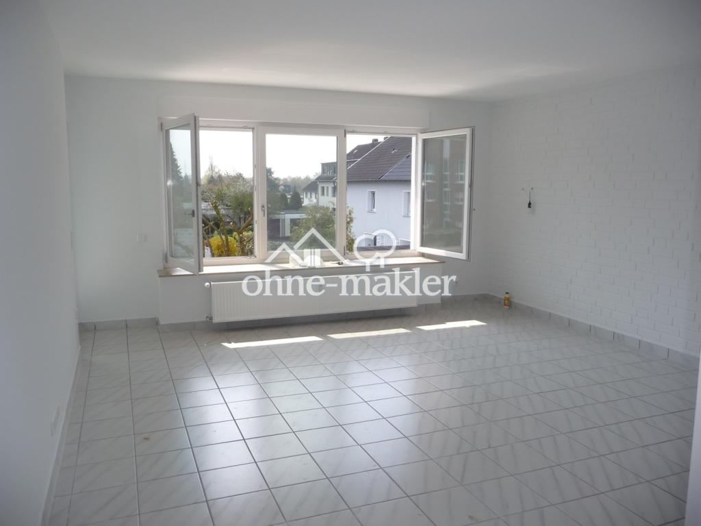 Wohnung mit überdachtem Südbalkon, kernsaniertem Bad und Einbauküche. - Foto 1
