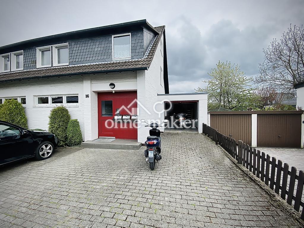 Garage und 2 Stellplätze