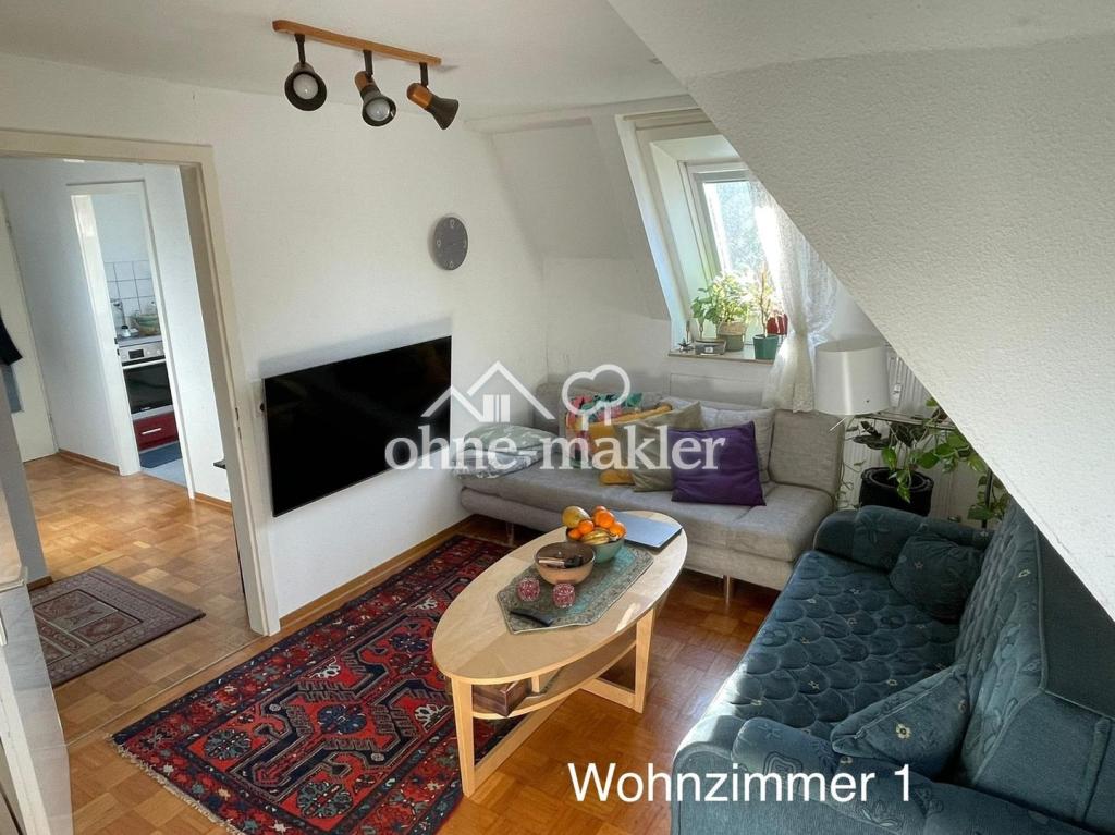Ruhig gelegene, modernisierte Dachgeschosswohnung mit Fernsicht - Photo 1