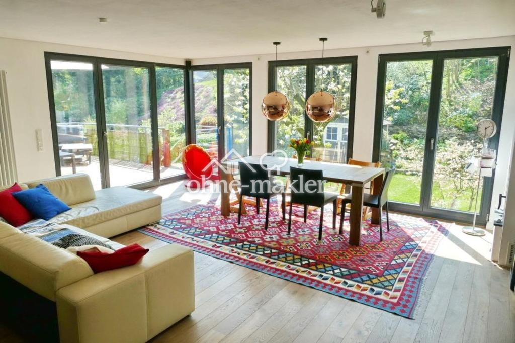 Exklusives Wohnen: Hochwertige 5-Zimmer-Wohnung mit Dachterrasse & Privatgarten - Foto 1