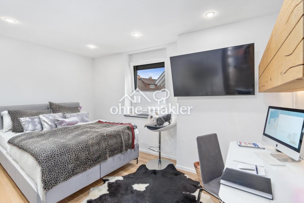 4-Zimmerwohnung in Traumlage mit Kachelofen, Balkon, Dachterrasse, Gästebad und Garage - Foto 4
