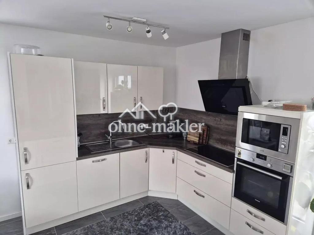 4 Zimmer-Neubauwohnung mit Einbauküche ink. E-Geräten und Stellplatz - Foto 4