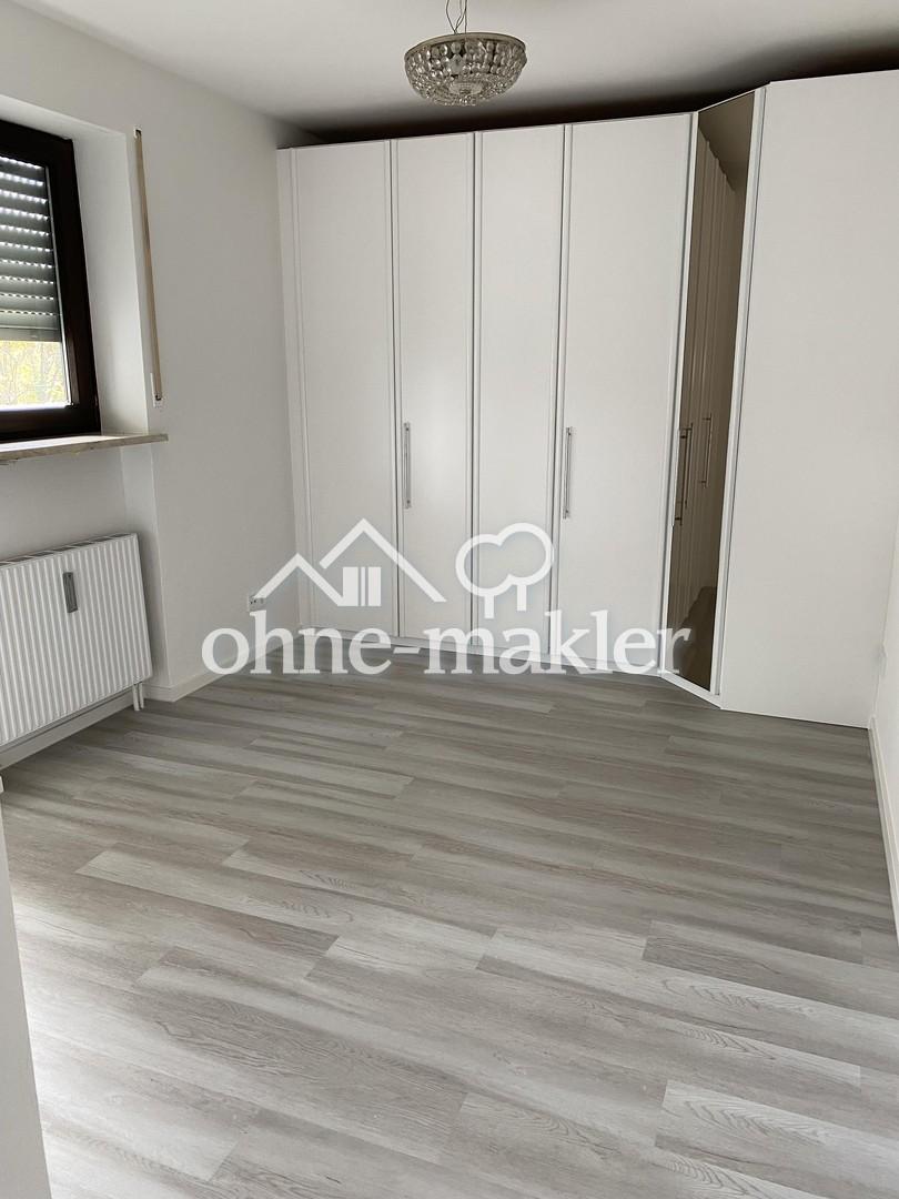 Schlafzimmer mit Einbauschrank