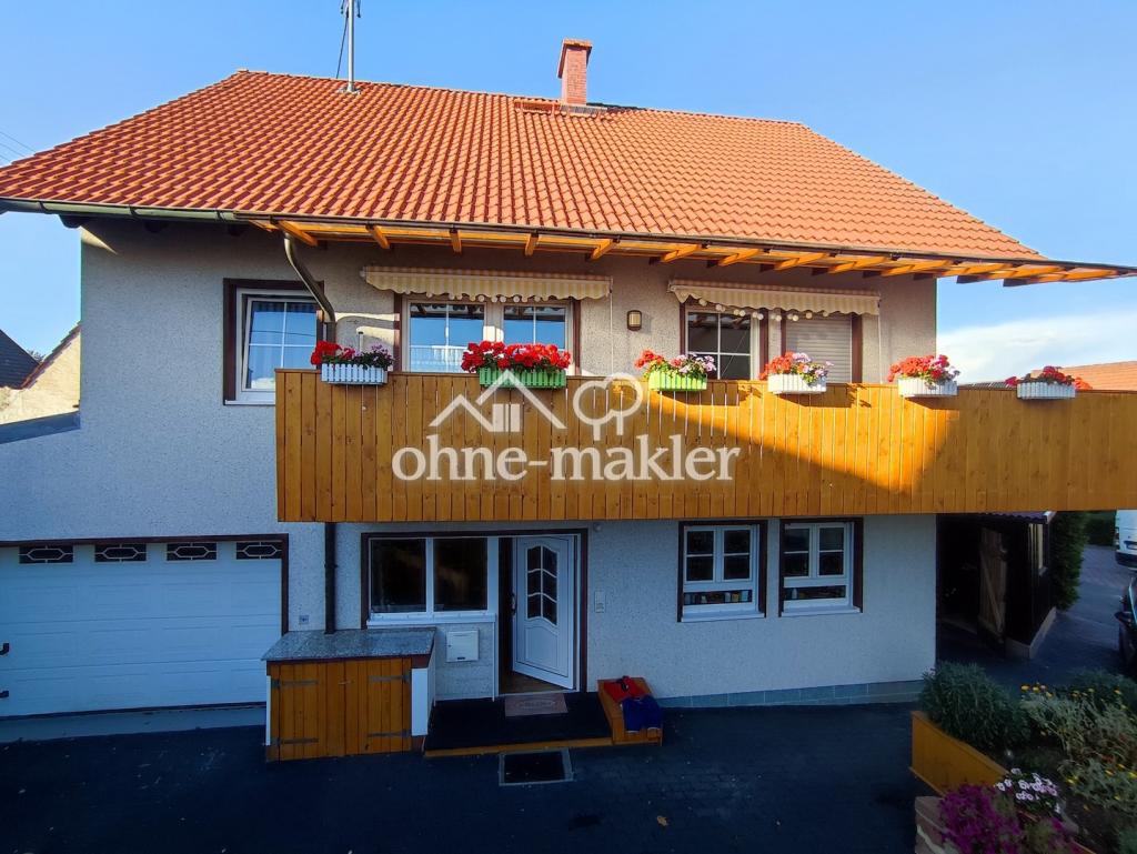 Südseite mit Balkon & Garage 1