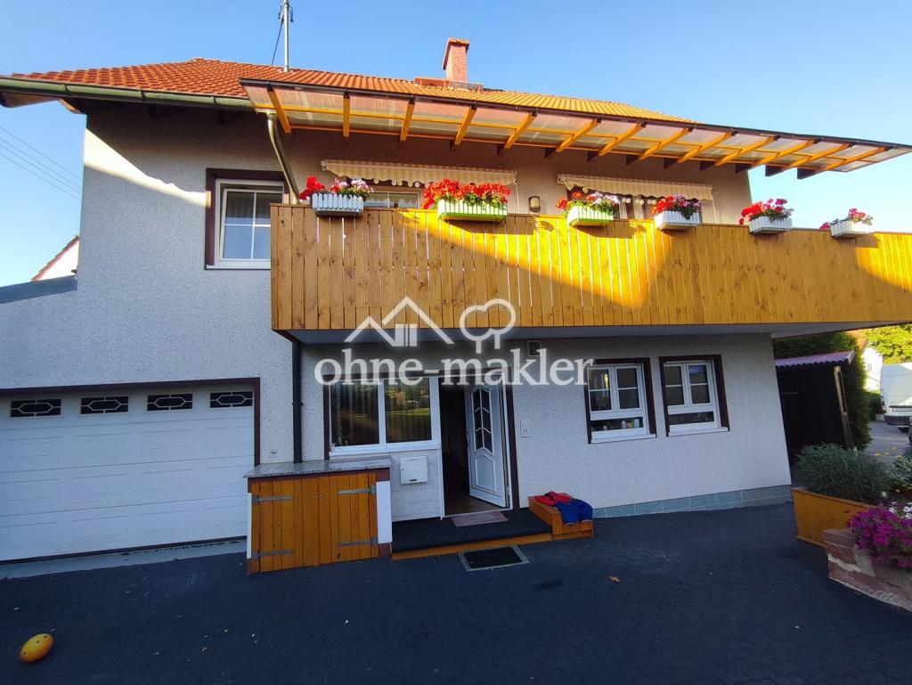 Südseite mit Balkon + Garage 2