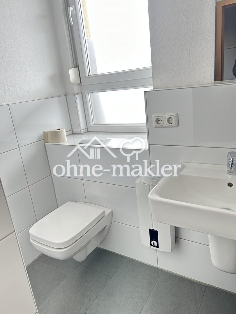 2 Zimmer, Einbauküche, Dachterrasse, im Zentrum - Foto 3