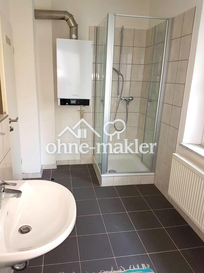 Sanierte 1-Zimmerwohnung mit geräumiger Einbauküche und hellem Bad in St. Leonhard - Foto 3