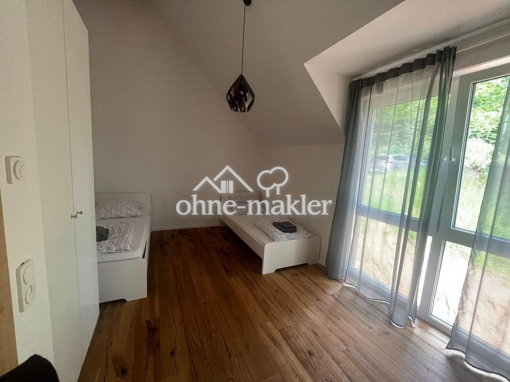Wunderschöne Neubau Wohnung in Waldrandlage mit tollen Blick über Siegburg! - Foto 4