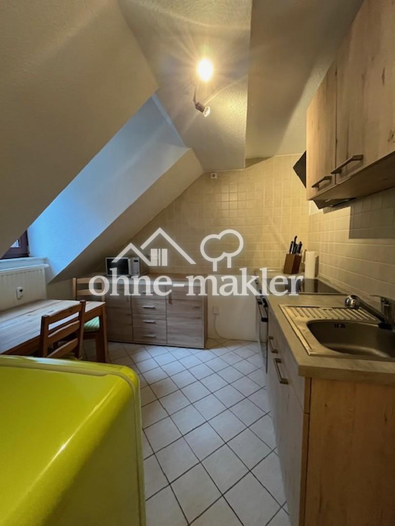 Schöne 2-Raum Dachgeschoss-Maisonette-Wohnung mit Einbauküche in ruhiger Lage - Foto 4