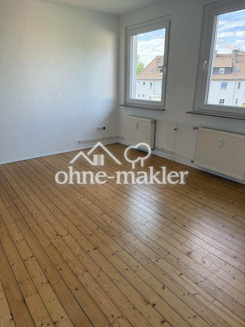 Zentrale, helle Etagenwohnung mit Balkon und Gartenteil - Foto 1