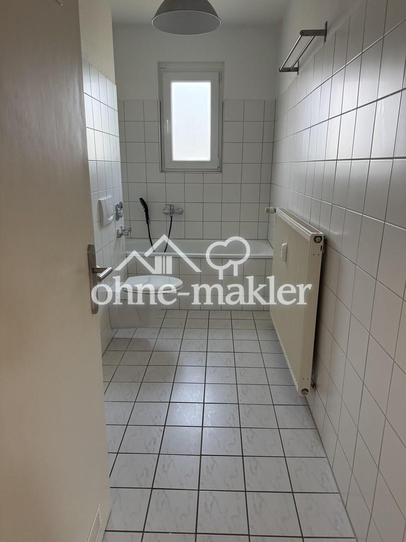 Zentrale, helle Etagenwohnung mit Balkon und Gartenteil - Foto 4