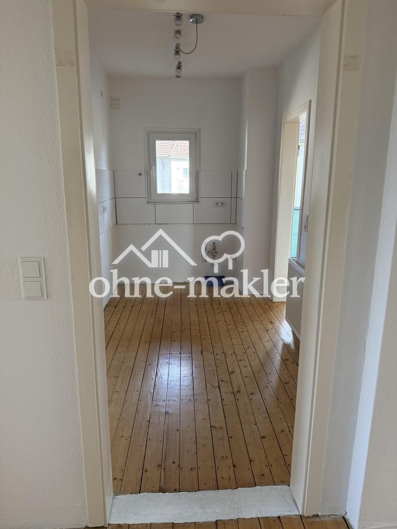 Zentrale, helle Etagenwohnung mit Balkon und Gartenteil - Foto 2