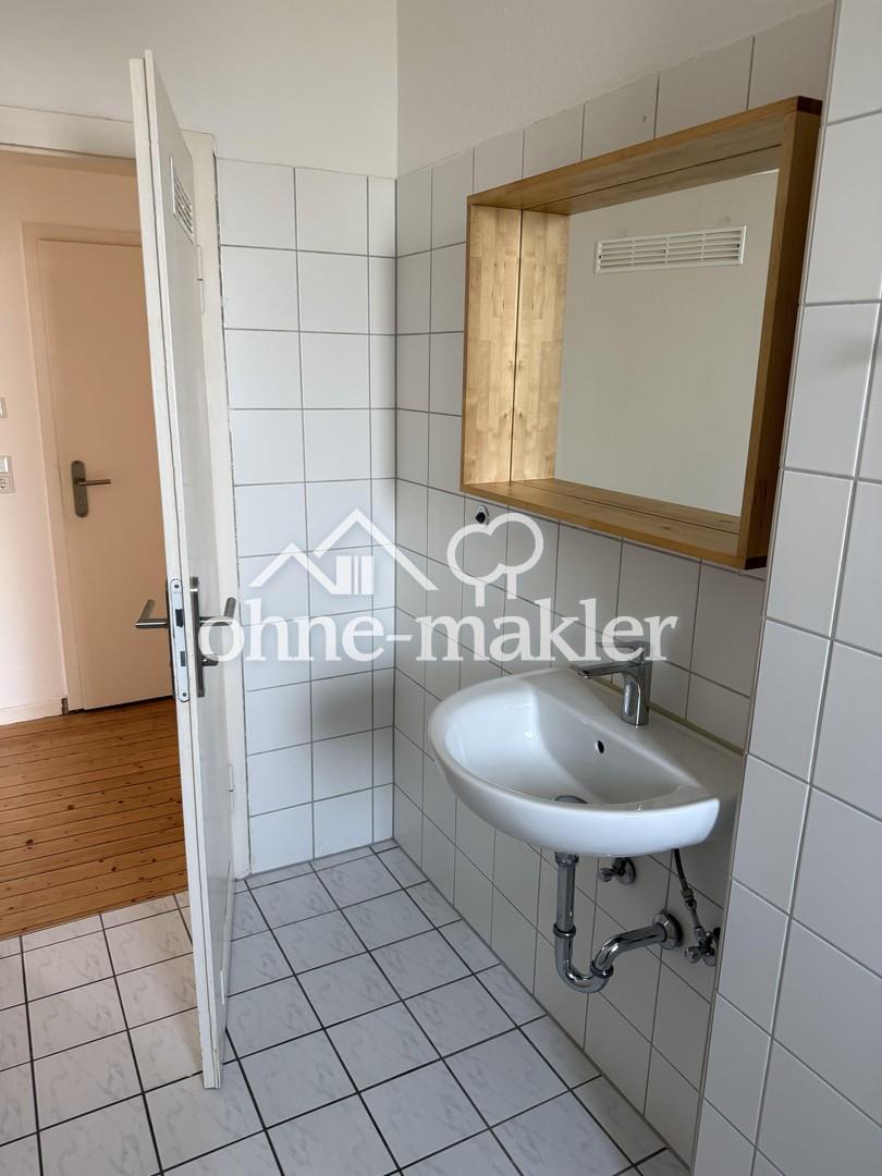 Zentrale, helle Etagenwohnung mit Balkon und Gartenteil - Foto 3