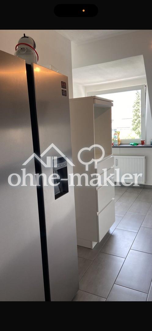 Zentral gelegene, ruhige DG-Wohnung im 6 Familienhaus - Foto 2
