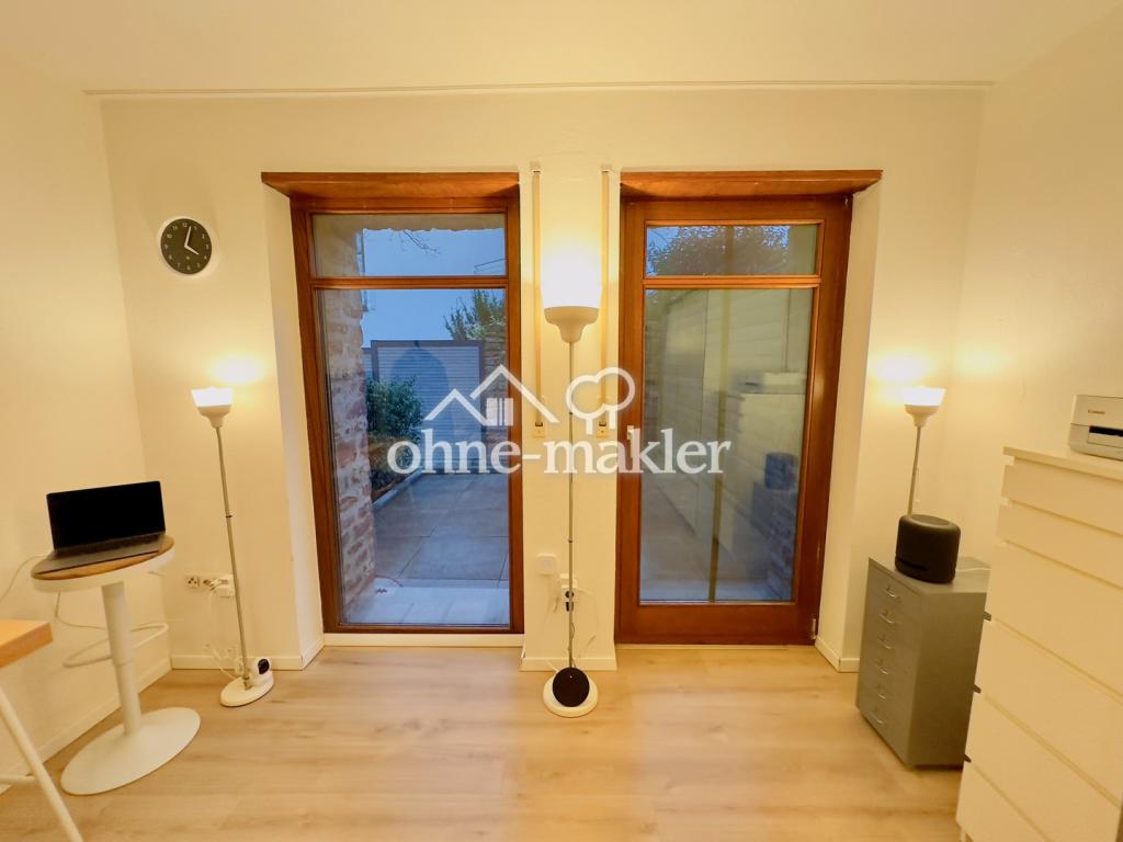 Attraktive, helle 1-Zimmer-Wohnung mit Stellplatz, Keller & Terrasse mitten in Ladenburg - Foto 1