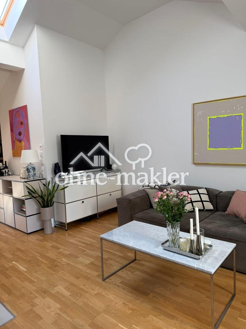 Wunderschöne Dachgeschosswohnung mit Blick auf den See - Foto 1