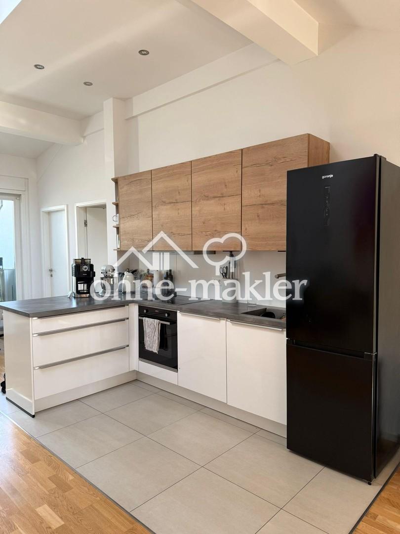 Wunderschöne Dachgeschosswohnung mit Blick auf den See - Foto 2