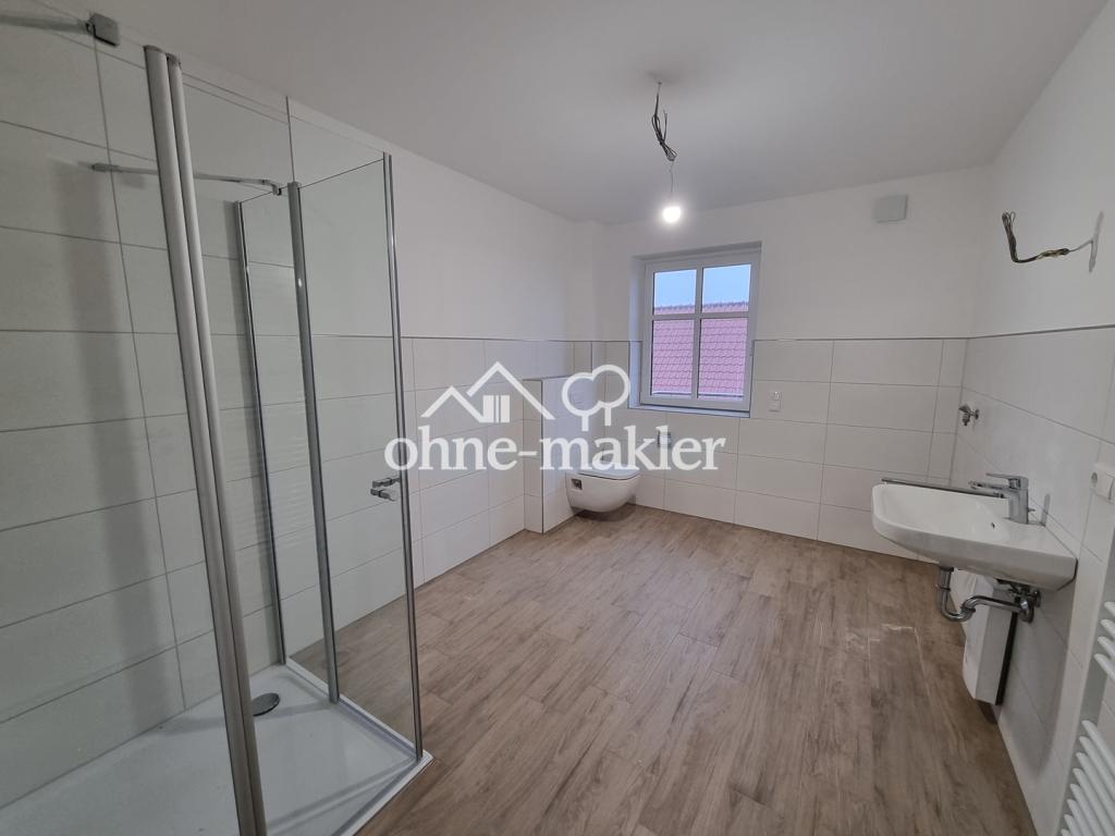 Attraktive 2-Zimmerwohnung mit Balkon im Neubau in Rethem/ Aller - Photo 3