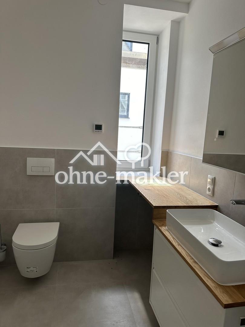 3 Zimmer Erdgeschosswohnung, Einbauküche, Terrasse und Garten - Foto 4