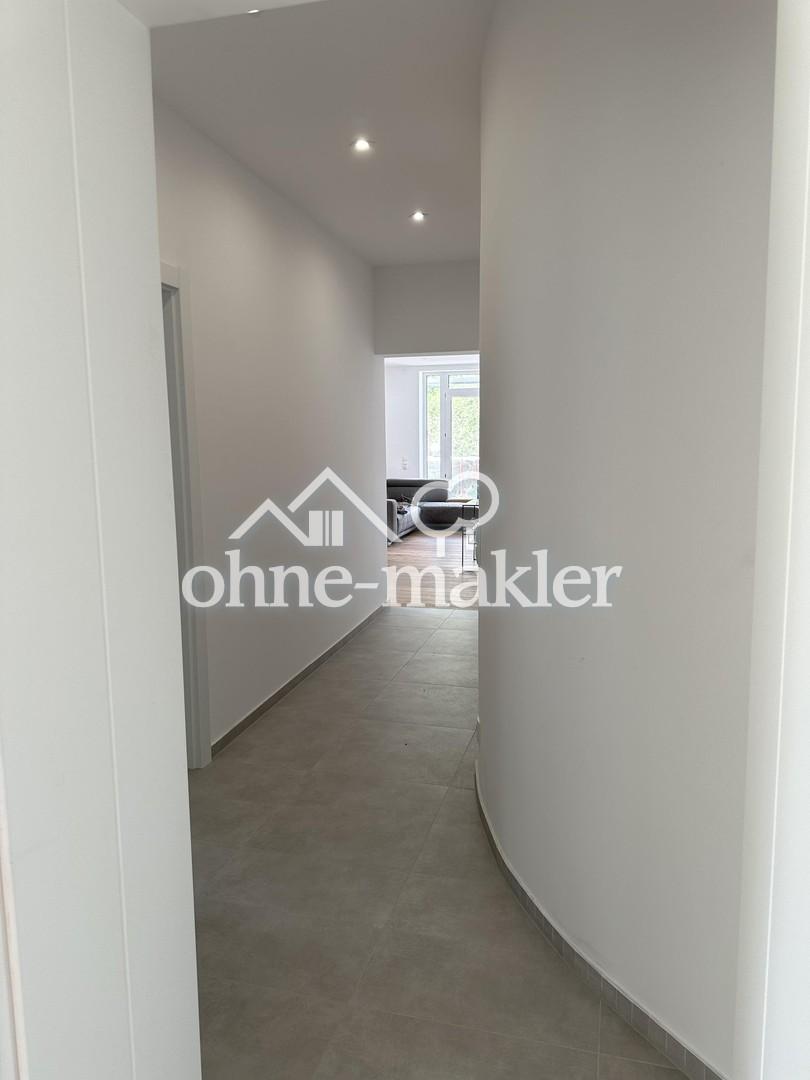 3 Zimmer Erdgeschosswohnung, Einbauküche, Terrasse und Garten - Foto 5