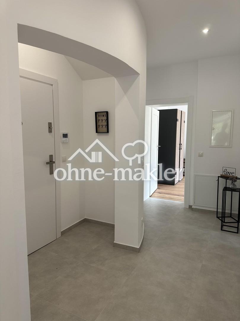 3 Zimmer Erdgeschosswohnung, Einbauküche, Terrasse und Garten - Foto 3