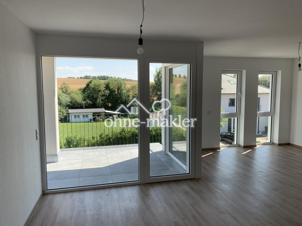 Premium 3-Zimmer-Wohnung mit 2 Balkonen, tollem Ausblick und EBK in Feldrandlage! A+ - Photo 1