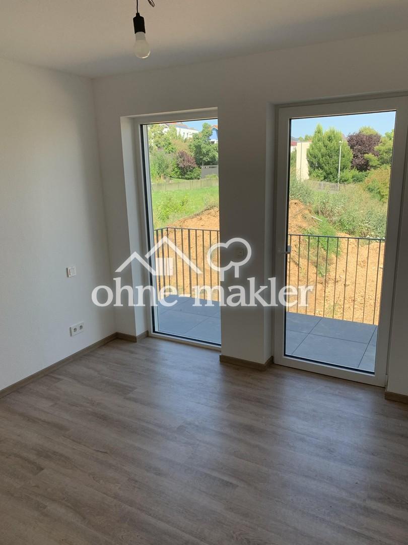 Premium 3-Zimmer-Wohnung mit 2 Balkonen, tollem Ausblick und EBK in Feldrandlage! A+ - Foto 2