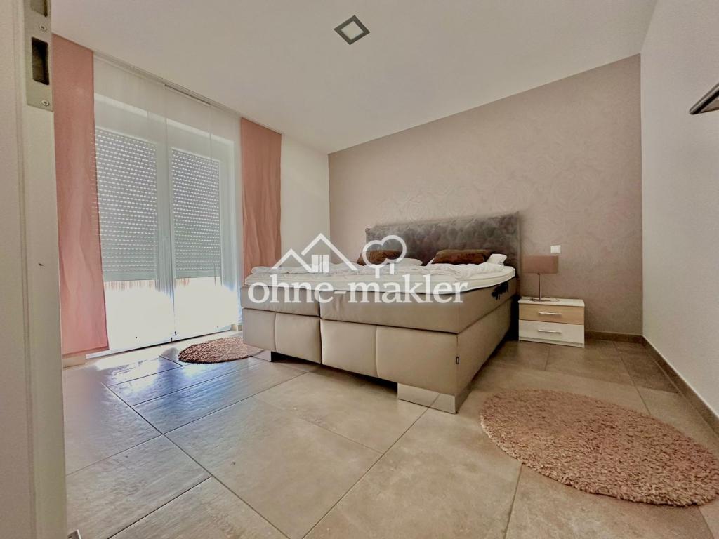 Schlafzimmer mit Balkon