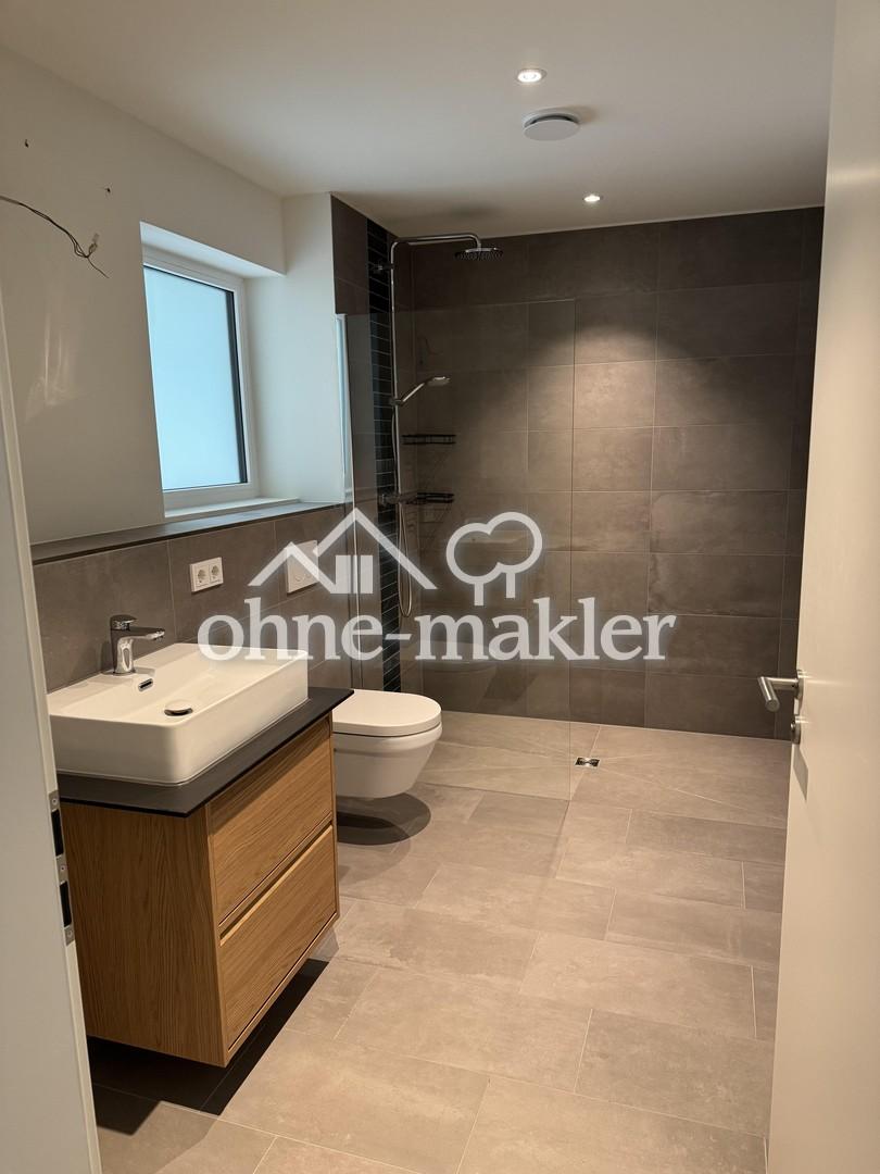 Stadtnah & naturnah: moderne, energieeffiziente 2-Zimmer-Neubauwohnung nahe Hamburg mit Smart Home - Photo 3