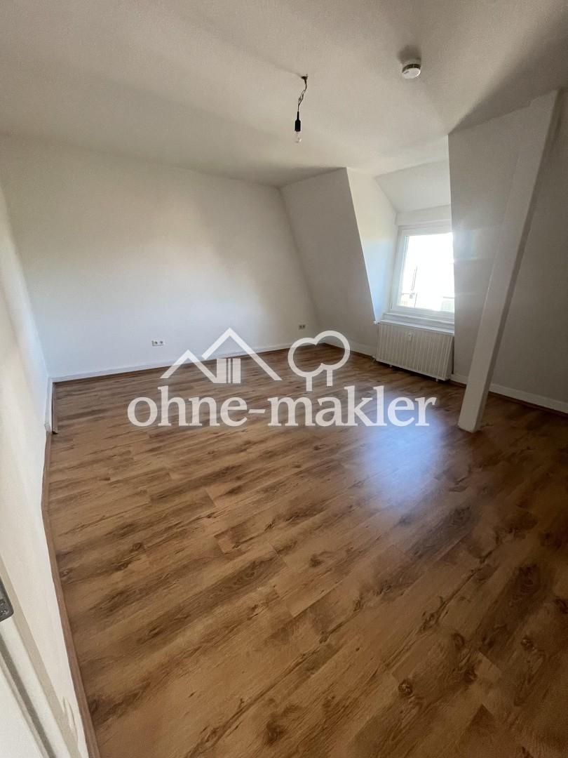 Geräumige Dachgeschosswohnung in Sterkrade - Photo 2