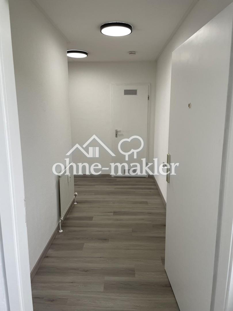 Exklusive renovierte Wohnung mit Balkon, neue EB-Küche und Tiefgaragenstellplatz - Photo 5