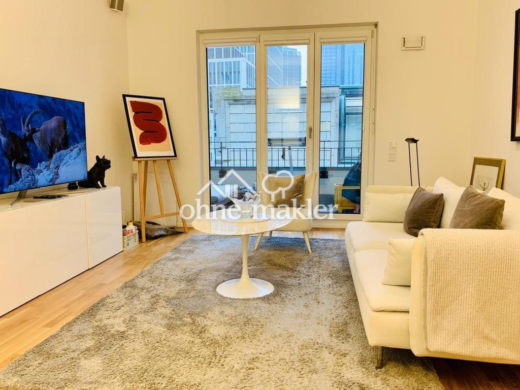Vollmöblierte sonnige 2,5 Zimmer Wohnung mit Skyline Blick - Photo 1
