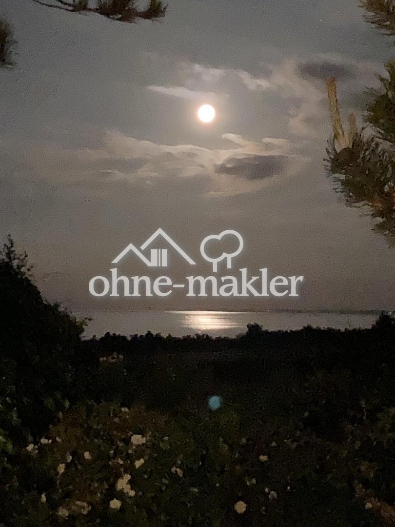 Mond über Wattenmeer