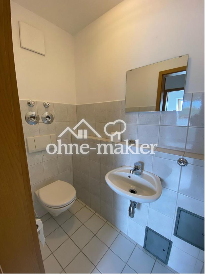 Helle 2-Zimmer-Dachgeschosswohnung mit Balkon und Stellplatz in zentraler Lage von Röthenbach - Foto 4